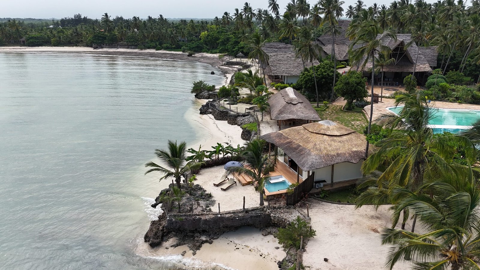 Aerial view of beach villa and resort pool