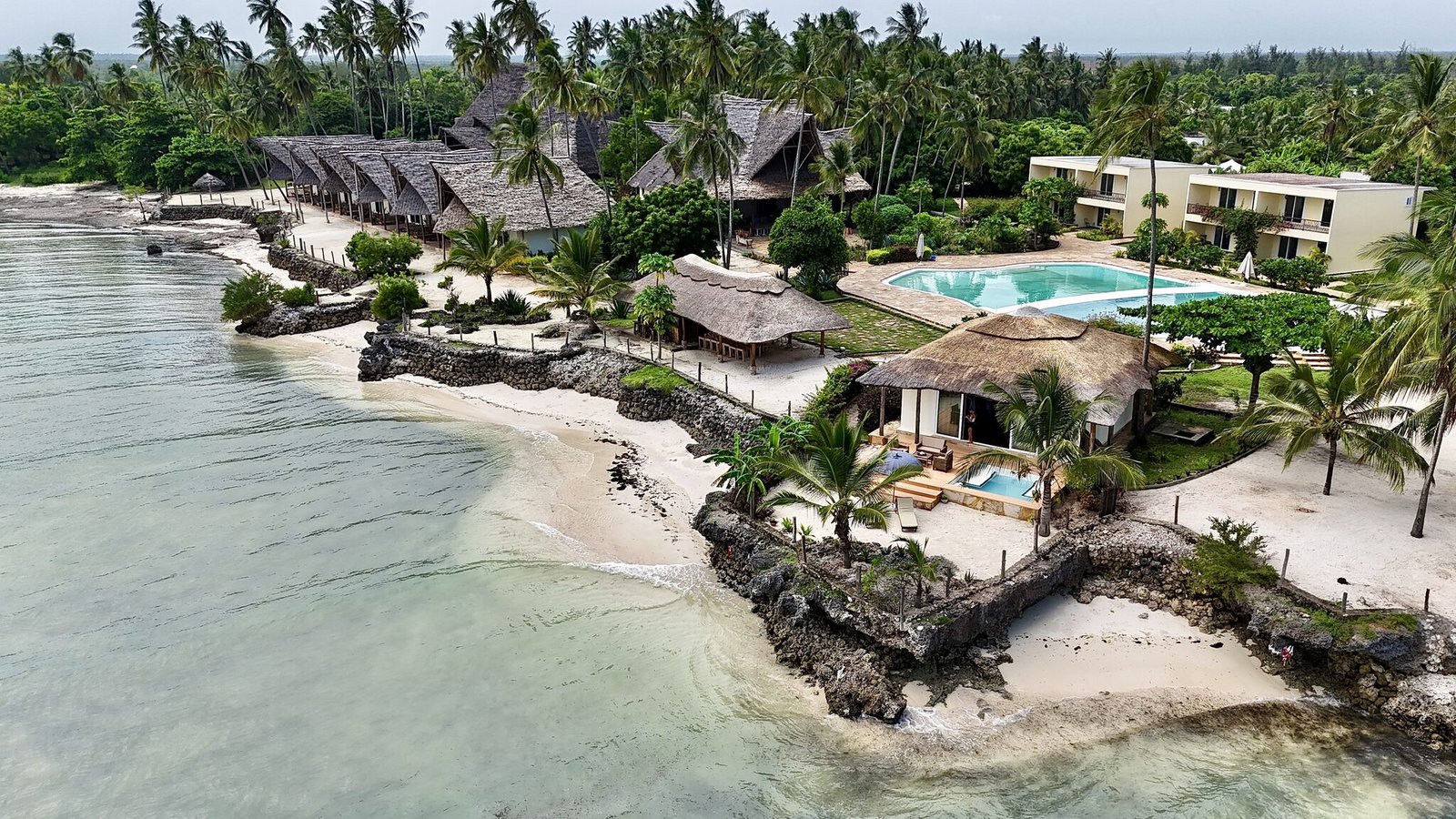 Aerial view of Maharaja Boutique Hotel pool and beachfront, Zanzibar