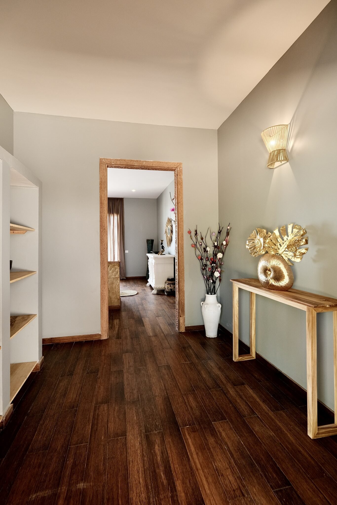 Beach Villa entrance hall with carved mirror and console