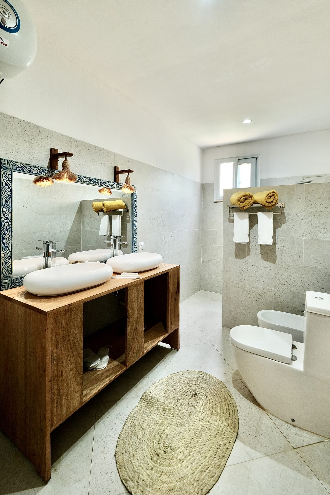 Deluxe Room en-suite bathroom with twin basins