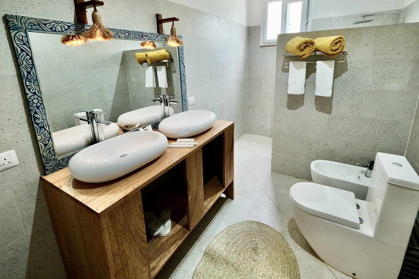 Deluxe Room bathroom with double basin and bidet