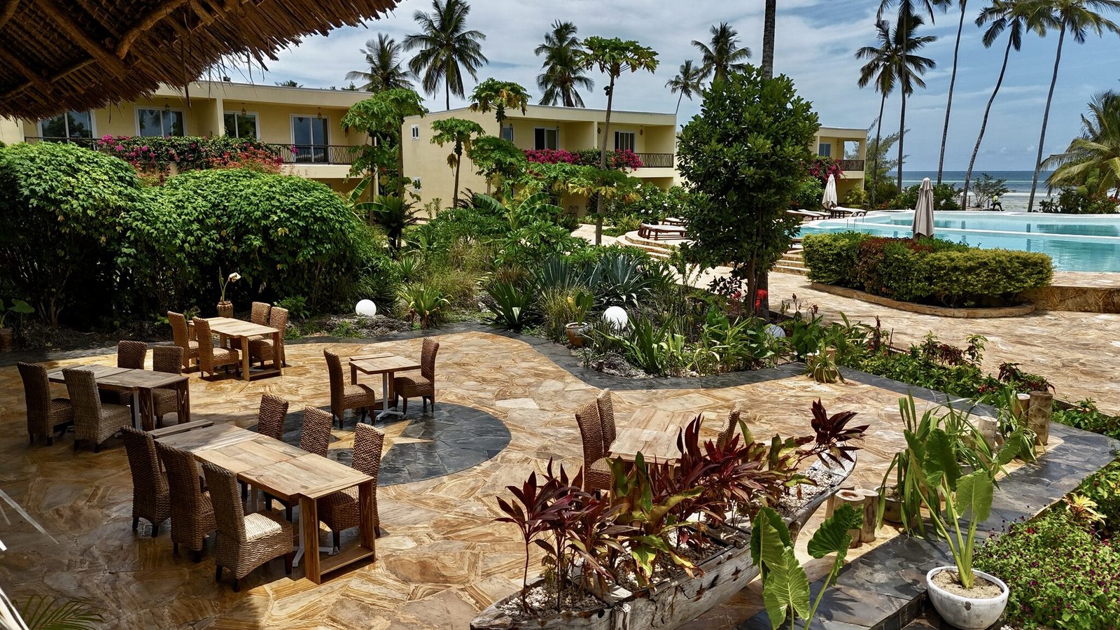 Tropical gardens and pool at Maharaja Boutique Hotel