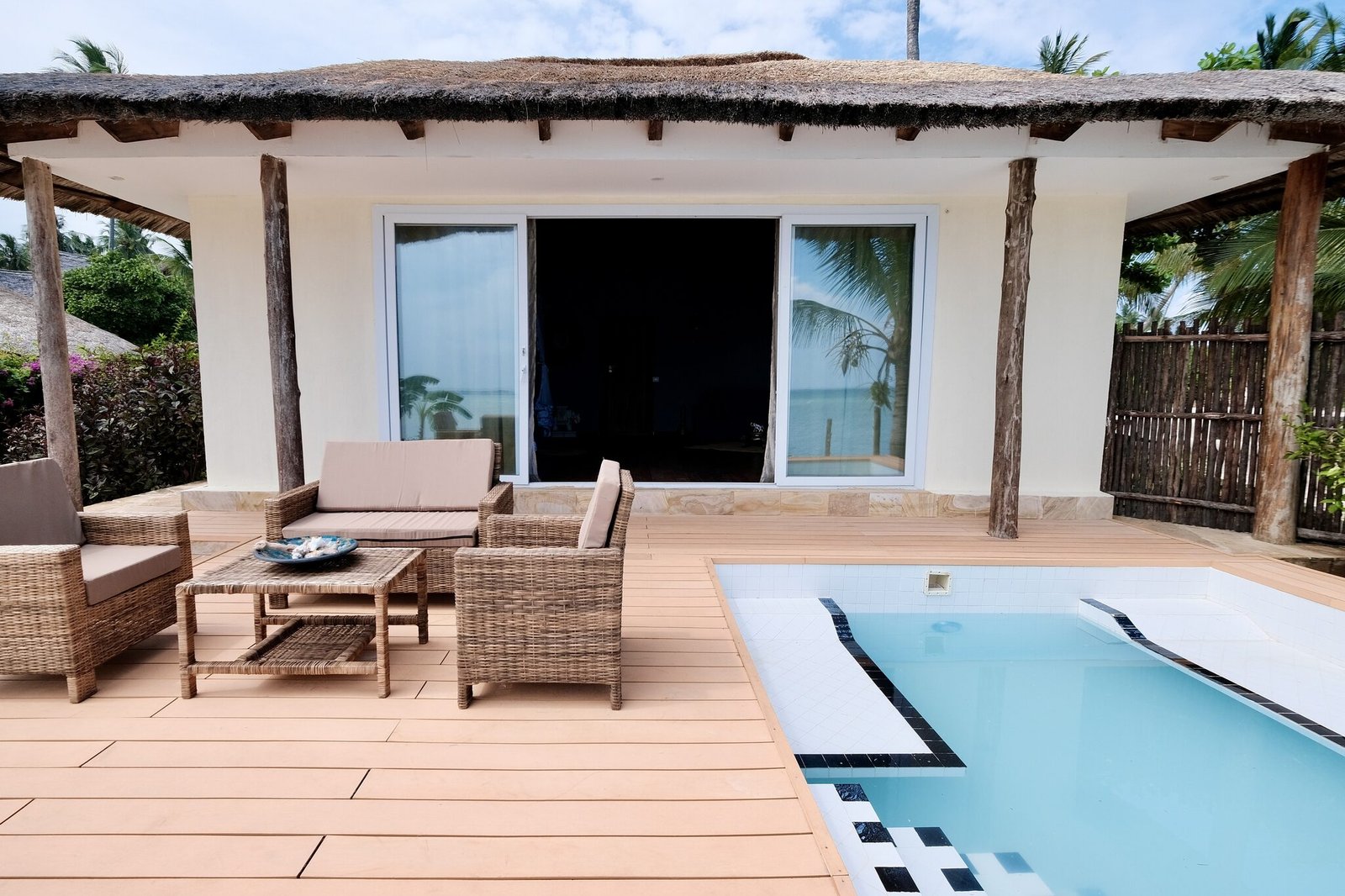 Luxury Villa exterior with private pool and direct beach access
