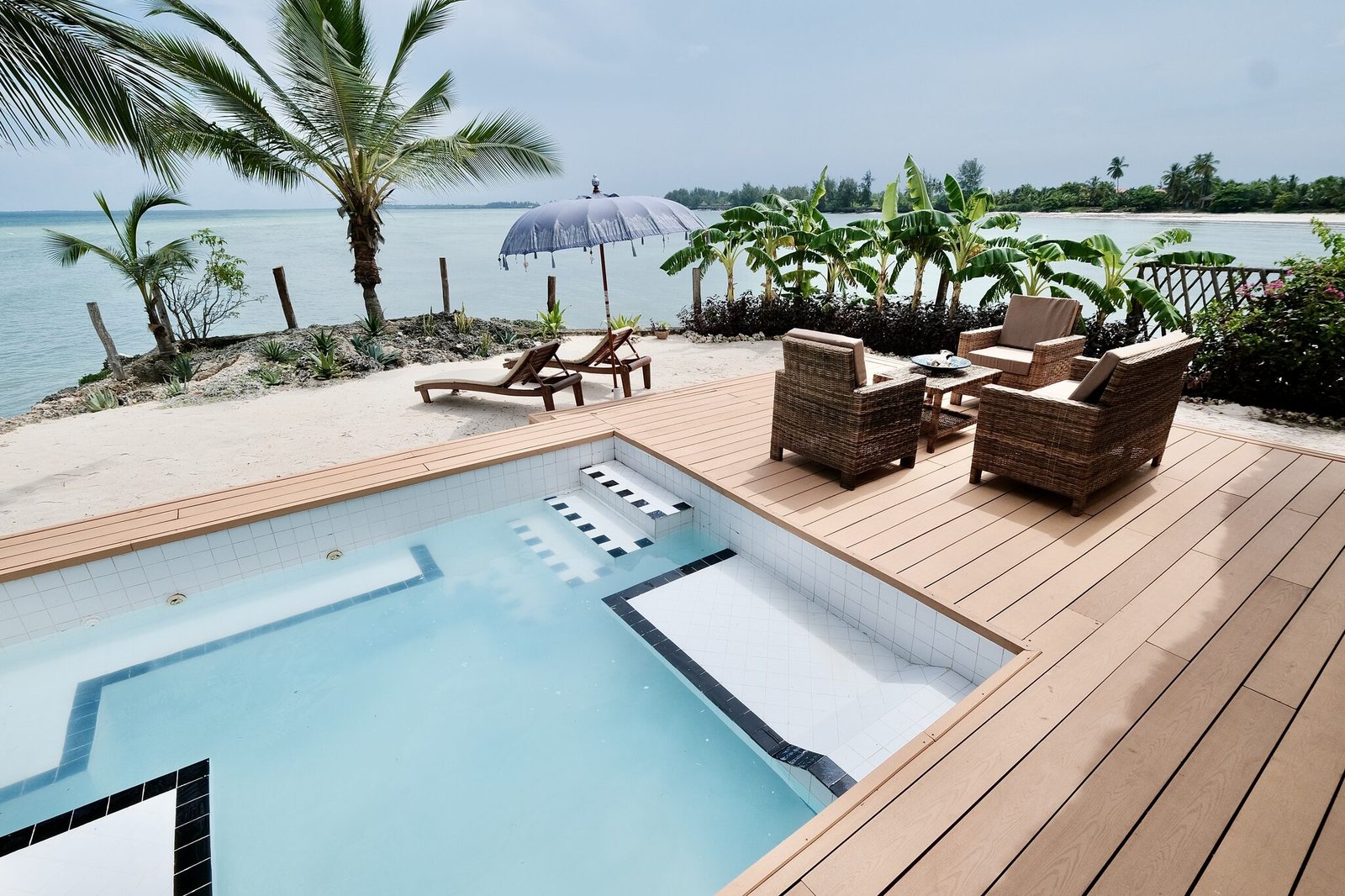 Luxury Villa sun deck with loungers beside the private pool