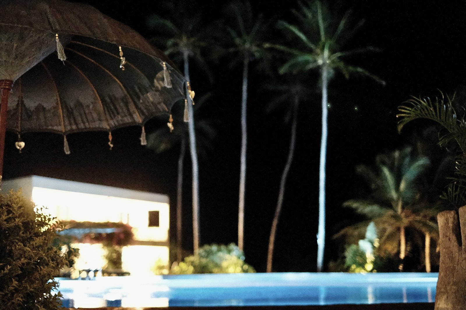 The swimming pool illuminated at night